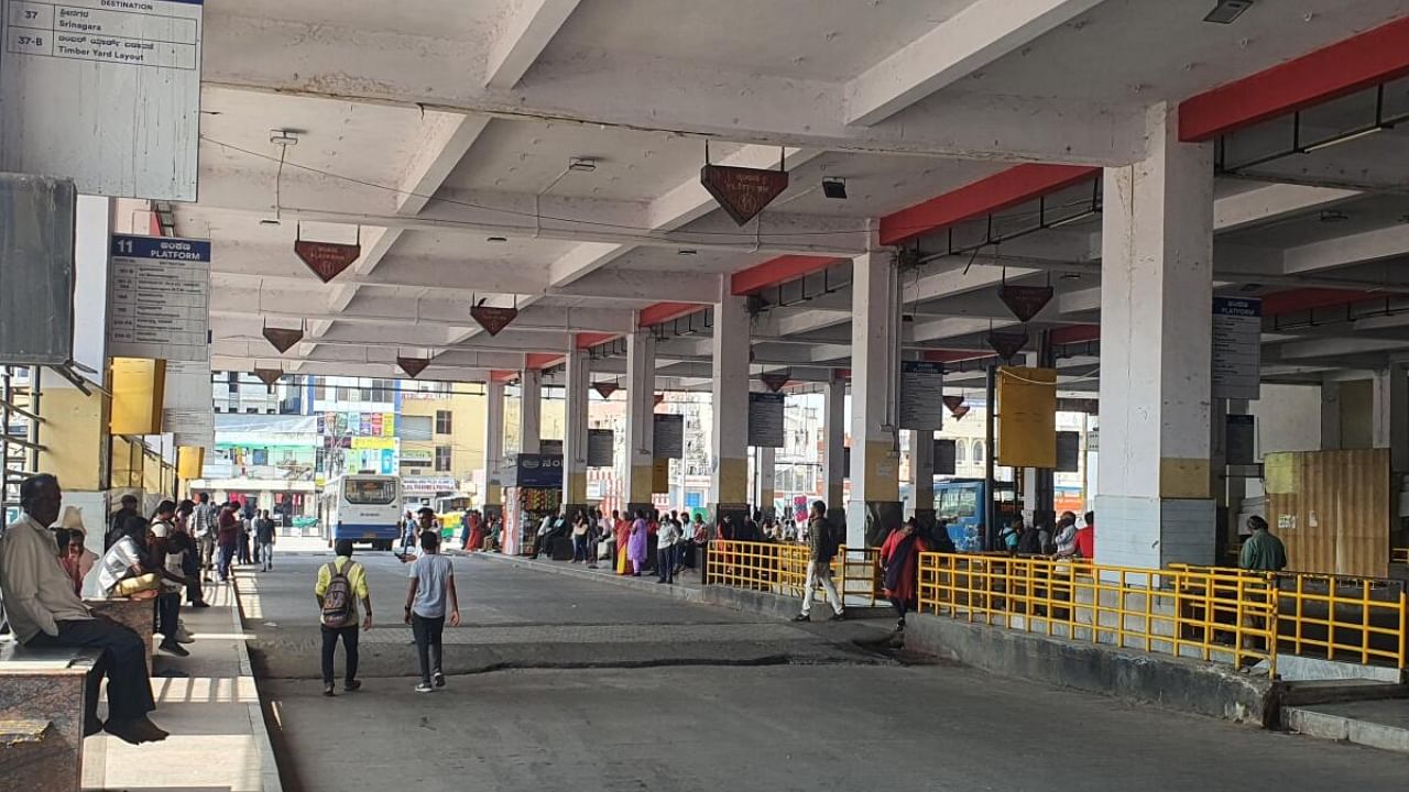 The Shivajinagar bus stand wore an empty look with passengers waiting, but no buses in sight. Credit: DH Photo