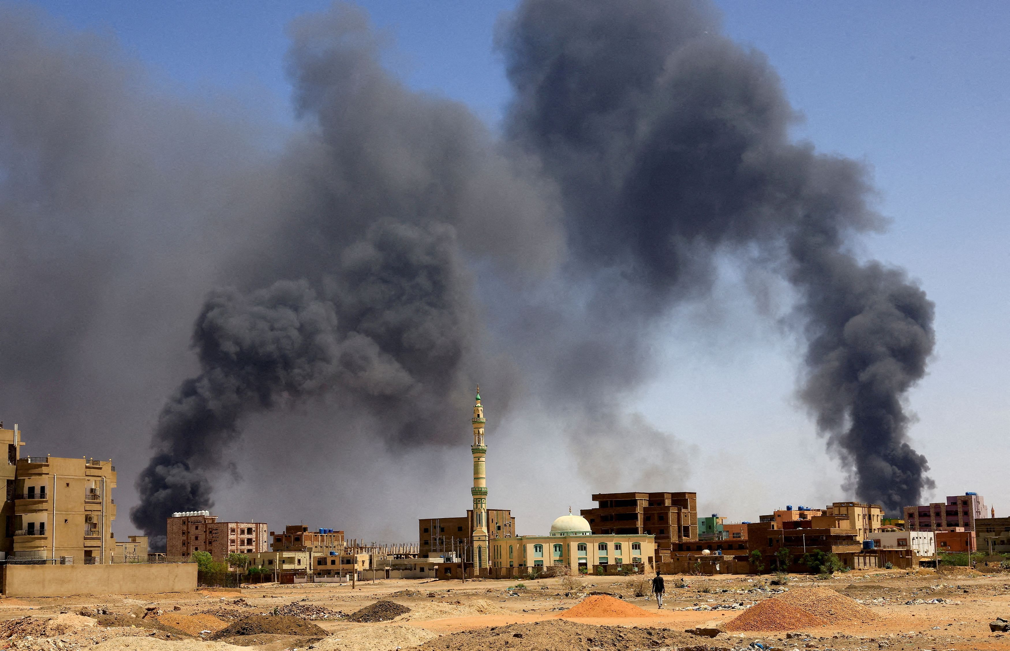  smoke rises above buildings after aerial bombardment in Khartoum North. Credit: Reuters Photo