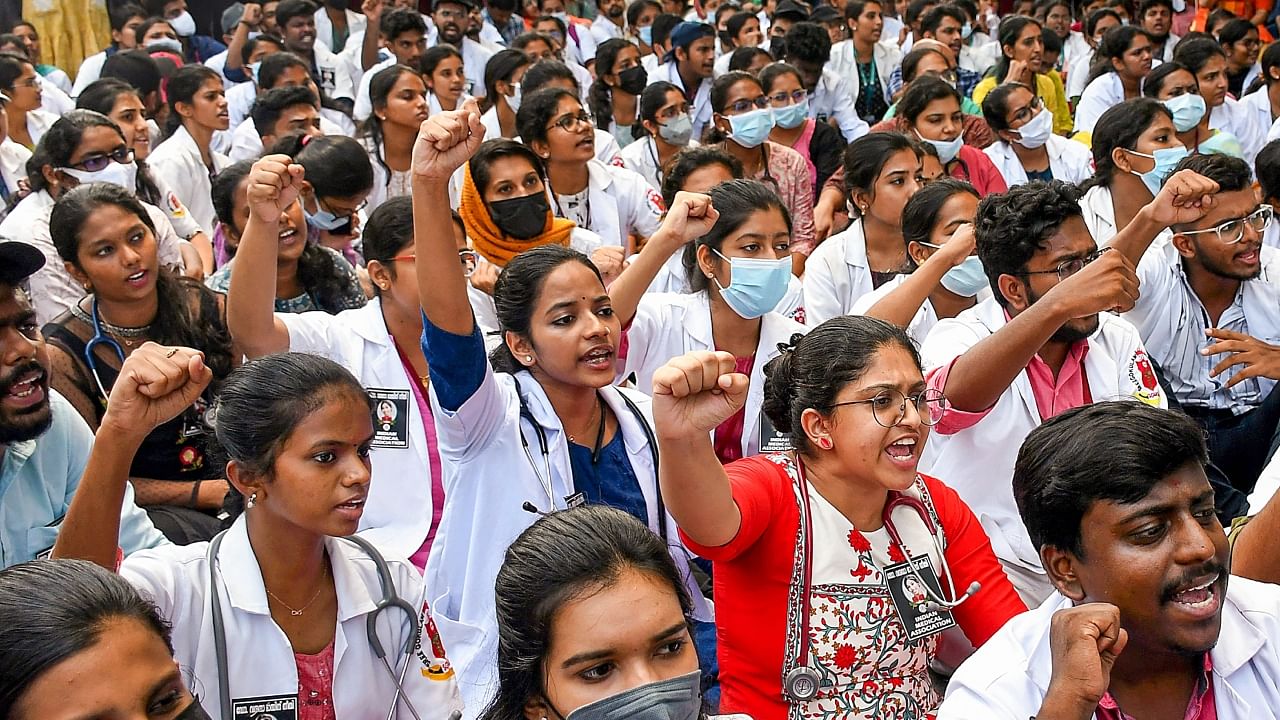 Doctors and medical students raise slogans during their protest in front of the State Secretariat against the killing of a female house surgeon Vandana Das who was stabbed to death by a violent patient at Kottarakkara taluk hospital, in Thiruvananthapuram, Thursday, May 11, 2023. Credit: PTI Photo