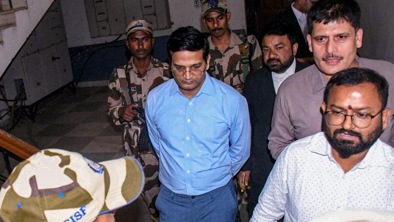 IAS officer Chhavi Ranjan being taken by ED officials to a Special PMLA court after he was arrested in a money laundering case, in Ranchi, Friday, May 5, 2023. Credit: PTI File Photo