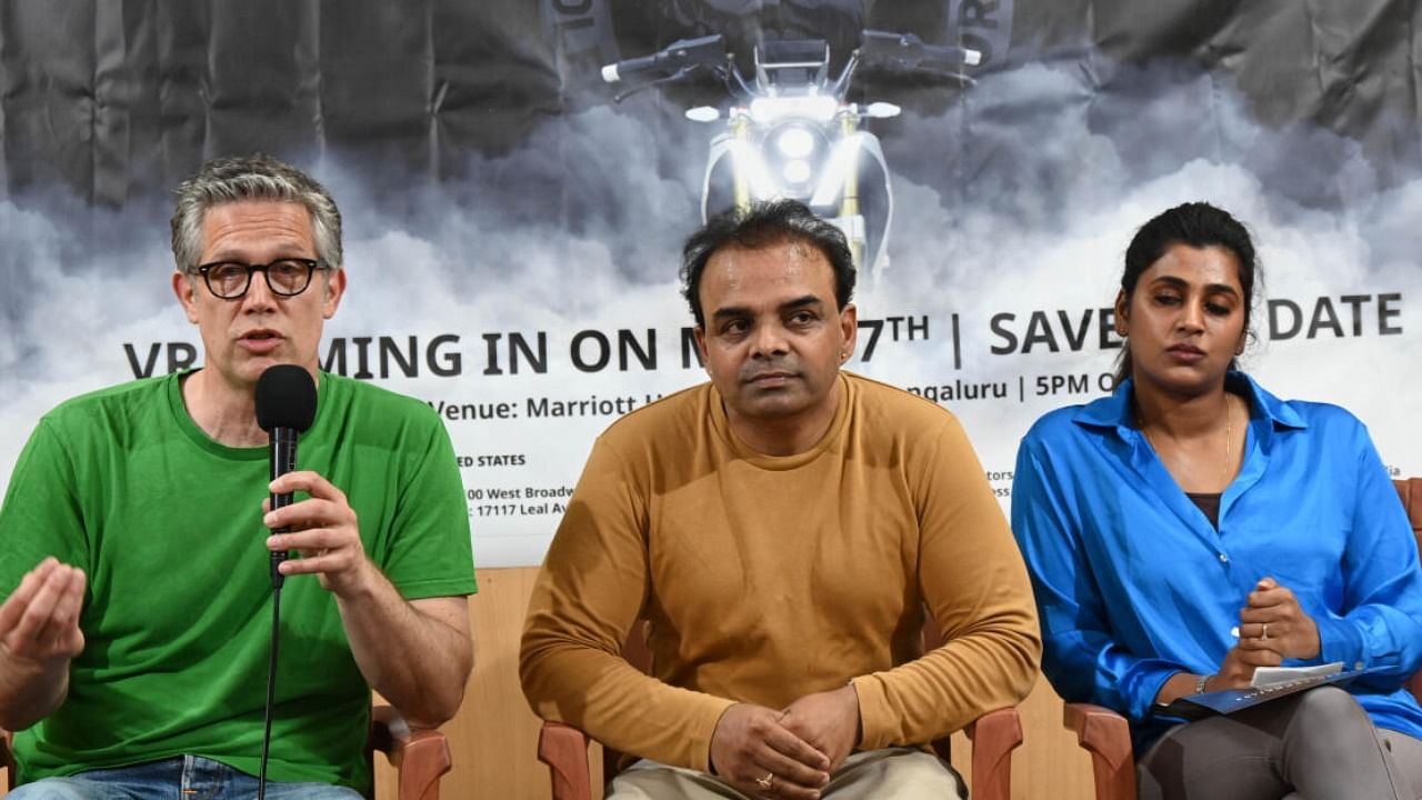Abraham Sarraf, Vasu Ram and Ayithi, founders and of Tau Lotus Motors at Press club of Bangalore on Thursday. DH Photo by B K Janardhan