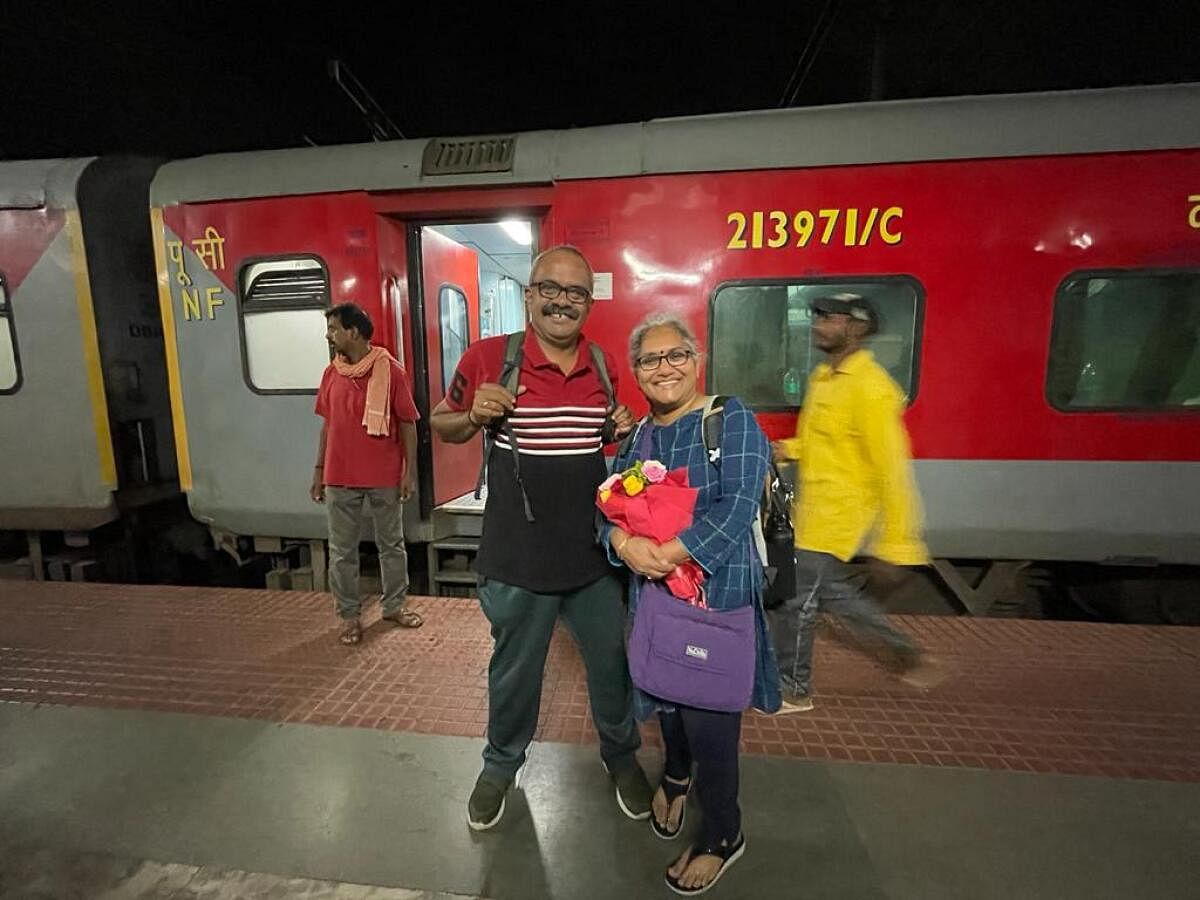 Rajesh and Jaishree Nair alight at the Thiruvananthapuram railway station after their 11-day train journey.