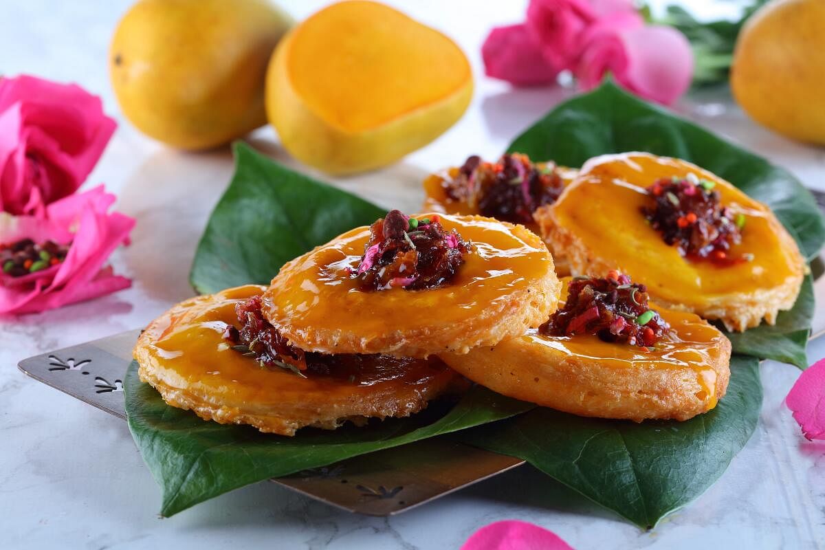 The special thali at Khandani Rajdhani offers dishes like mango gulkand malpua.