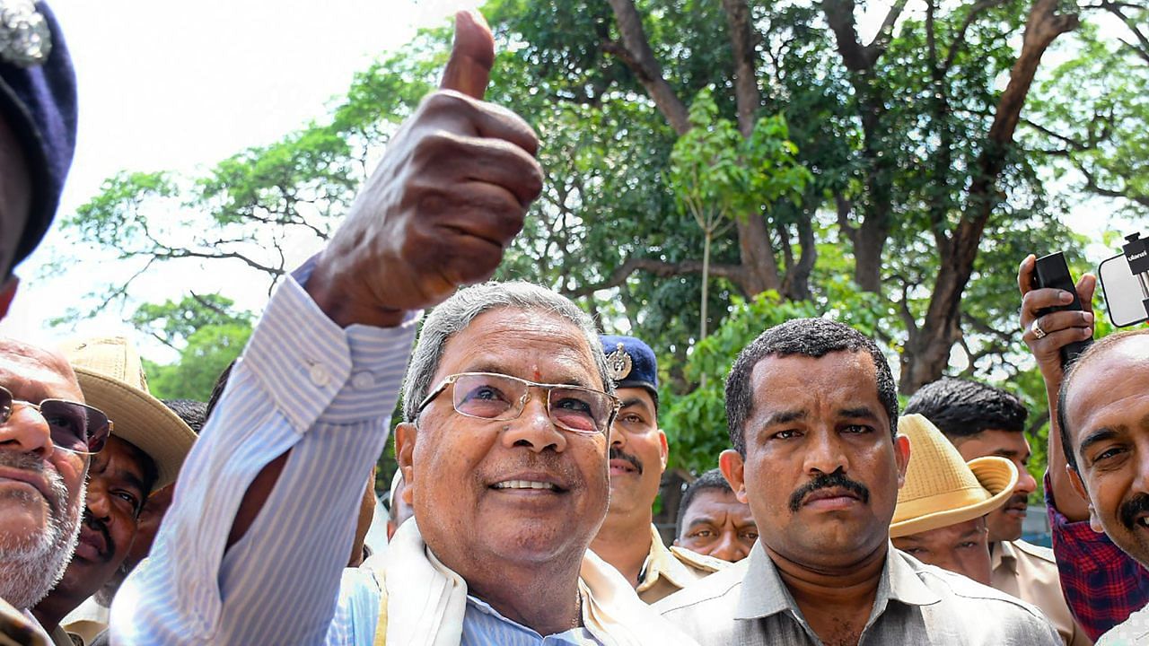 Congress leader Siddaramaiah reacts as the party leads in Assembly polls in the early trends on the vote counting day. Credit: PTI Photo