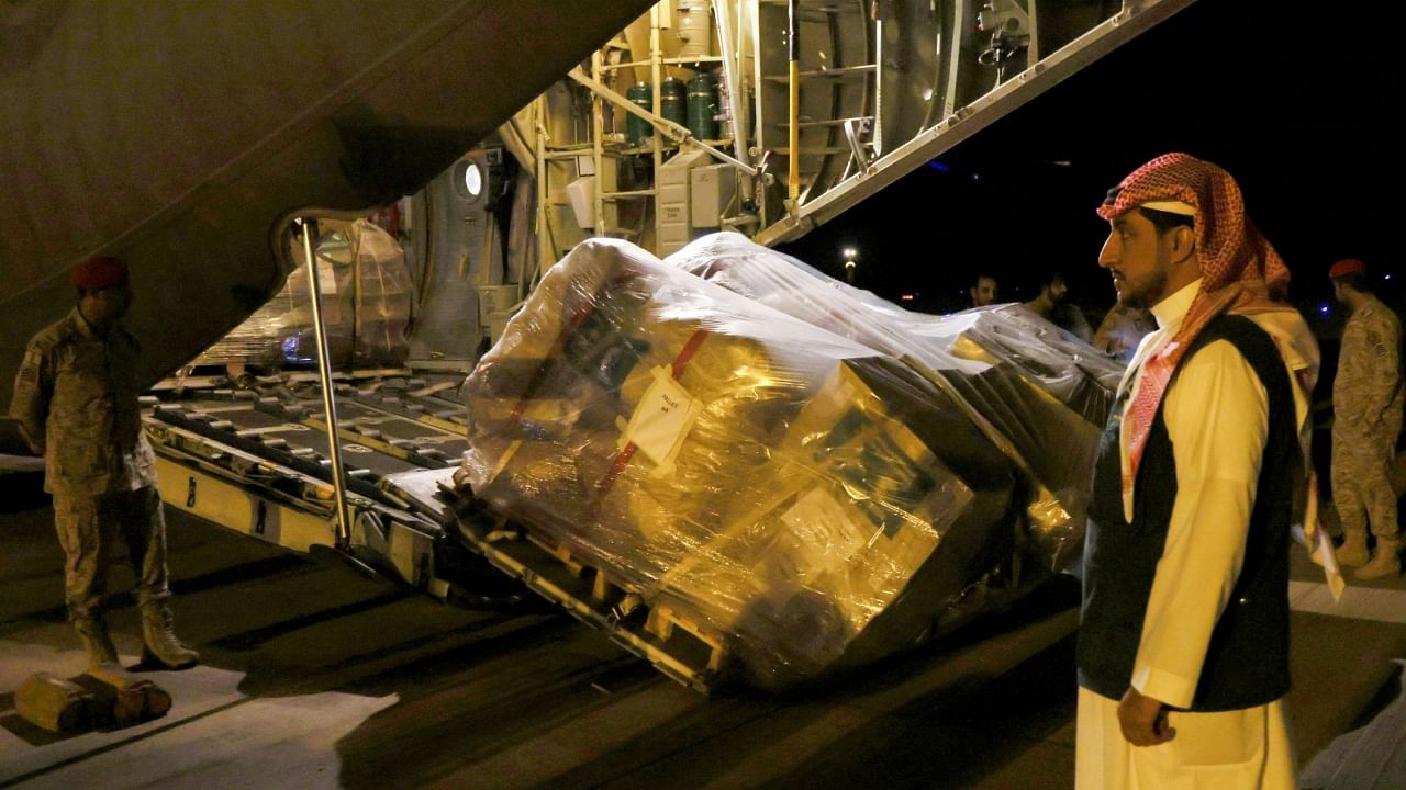 Aid from King Salman Humanitarian Aid and Relief Centre from Saudi Arabia is unloaded from a Saudi Royal Air Force cargo plane at Port Sudan International Airport, Sudan, May 11, 2023. Credit: Reuters Photo