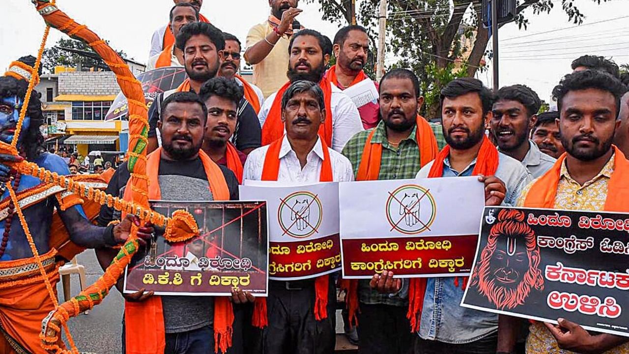 Bajrang Dal activists stage a protest against Congress party over its election manifesto in Chikmagalur, Friday, May 5, 2023. Credit: PTI Photo