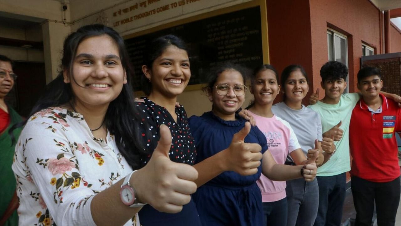 Students celebrate after the CBSE result declaration. Credit: PTI Photo