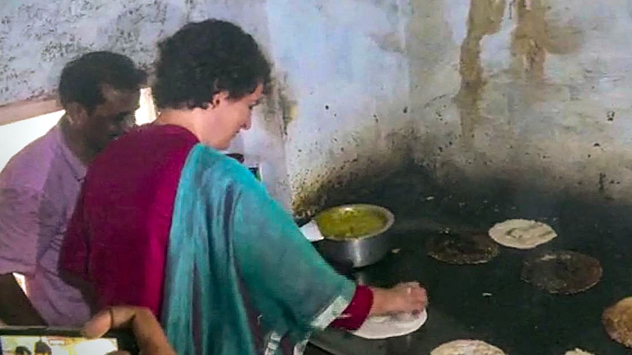  Priyanka Gandhi Vadra tries her hand at making 'masala dosa' at a hotel during visit ahead of assembly polls, in Mysuru. Credit: PTI Photo