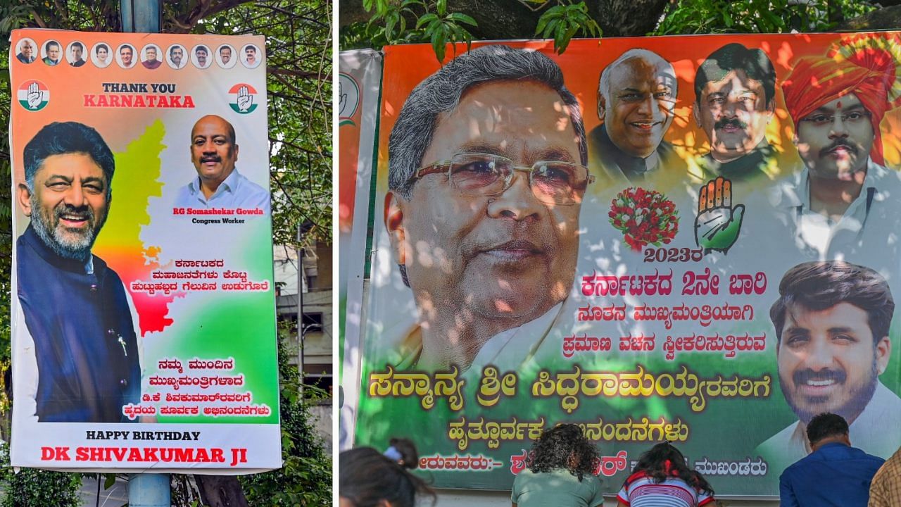 Flex boards put up by the supporters of Congress leaders D K Shivakumar and Siddaramaiah in Bengaluru on Sunday. Credit: DH Photo/S K Dinesh