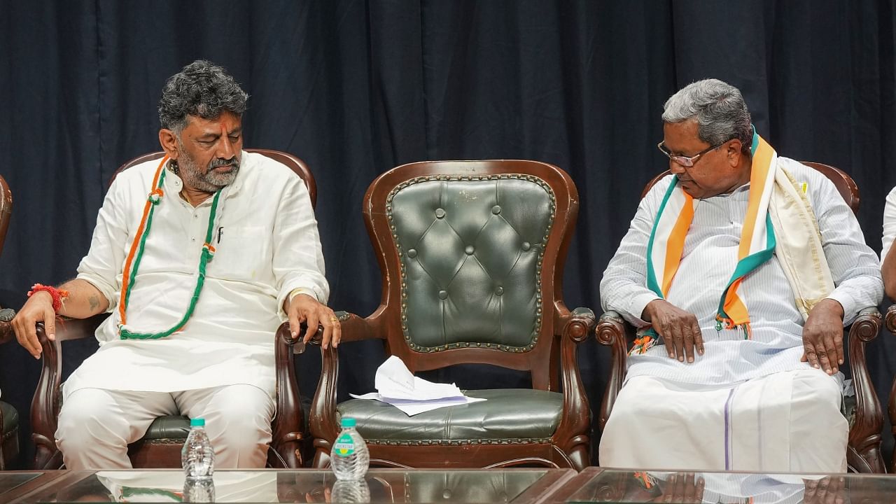 Former Karnataka CM Siddaramaiah and Karnataka Congress President D K Shivakumar during celebrations after the party's win in Karnataka Assembly elections, in Bengaluru, Saturday, May 13, 2023. Credit: PTI Photo