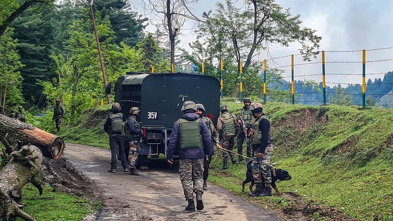 Security personnel during an encounter with militants, in Anantnag district, Sunday, May 14, 2023. Credit: PTI Photo