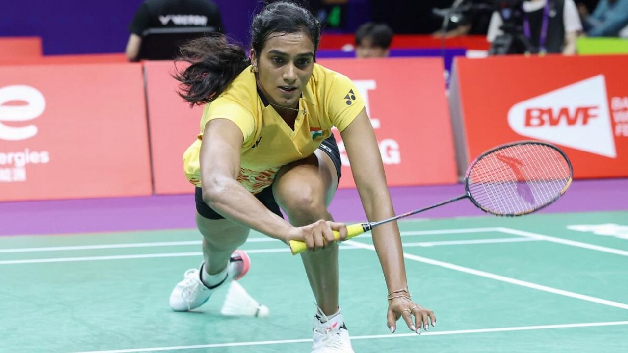 PV Sindhu of India hits a return to Tai Tzu-ying of Taiwan during their women's singles match of the Sudirman Cup Finals 2023 world badminton championships in Suzhou, in China's eastern Jiangsu province on May 14, 2023. Credit: AFP Photo