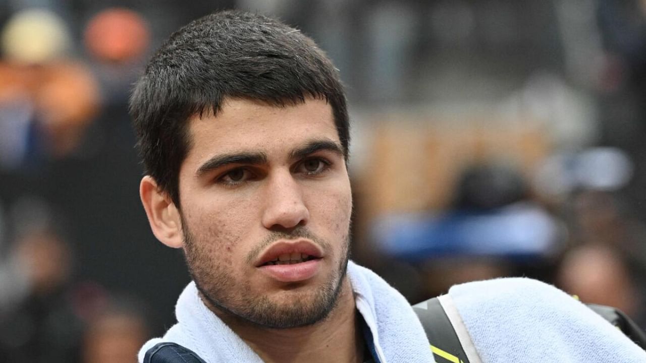 Spain's Carlos Alcaraz leaves after defeating Spain's Albert Ramos during their second round match at the Men's ATP Rome Open tennis tournament on May 13, 2023 at Foro Italico in Rome. Credit: AFP Photo