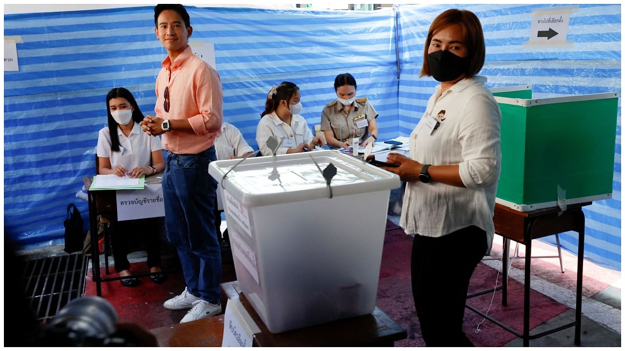 Move Forward Party leader and prime ministerial candidate, Pita Limjaroenrat, stands at a polling station during the general election in Bangkok, Thailand, May 14, 2023. Credit: Reuters Photo