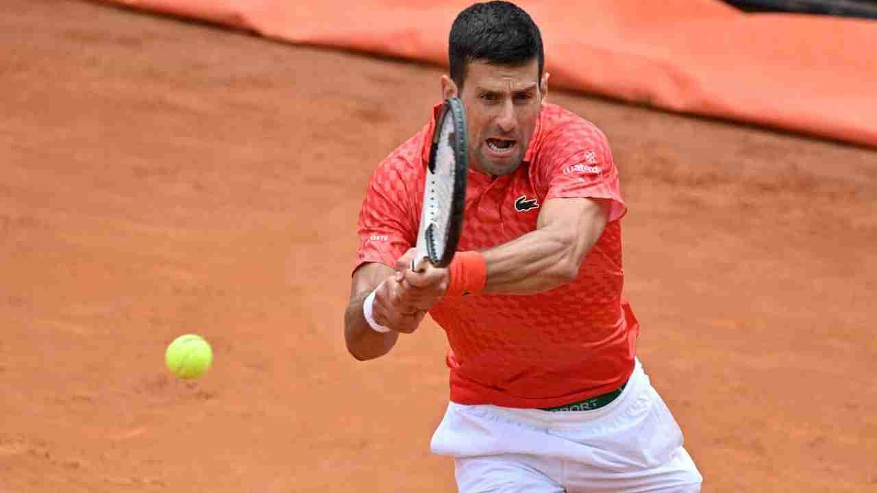 Serbia's Novak Djokovic returns to Britain's Cameron Norrie during their fourth round match of the Men's ATP Rome Open tennis tournament at Foro Italico in Rome on May 16, 2023. Credit: AFP Photo