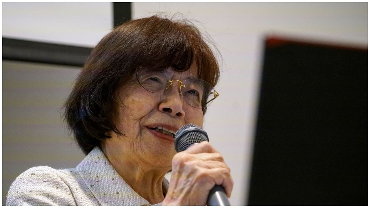 Teruko Yahata (85), a World War Two Hiroshima atomic bombing survivor, speaks about her story of the horrors of Hiroshima to foreign visitors at the Hiroshima Peace Memorial Museum in Hiroshima, western Japan . Credit: Reuters