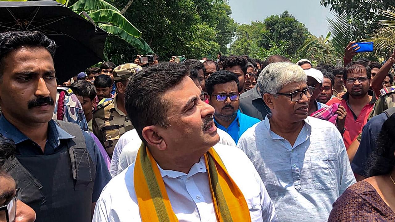 Senior BJP leader Suvendu Adhikari visits the village where an explosion at an illegal firecracker unit claimed the lives of nine people on Tuesday, at Egra in Purba Medinipur district, Wednesday, May 17, 2023. Credit: PTI Photo