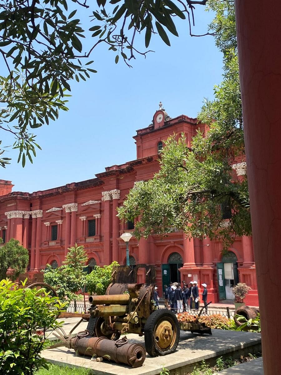 The Government Museum is on Kasturba Road, adjacent to Cubbon Park. 