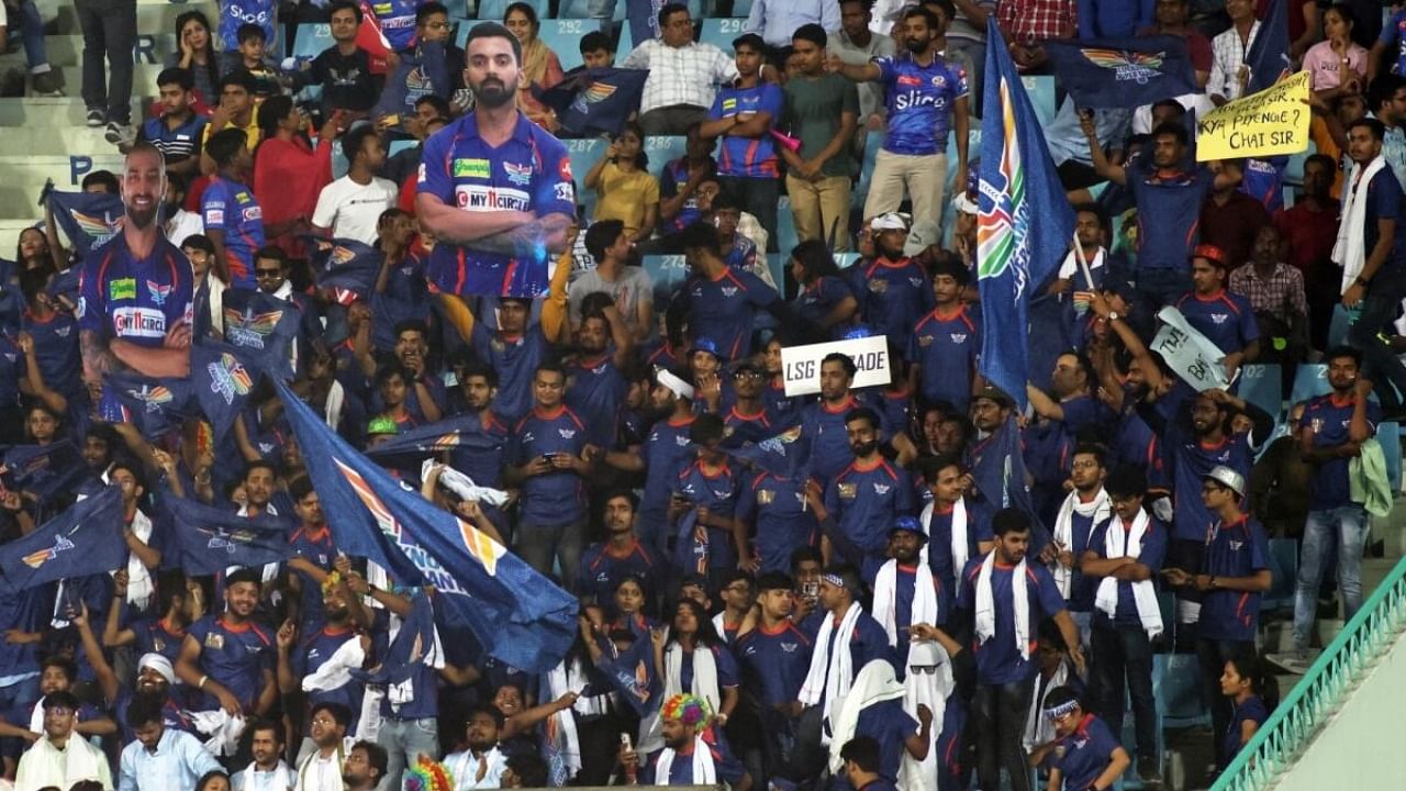 Lucknow Super Giants fans cheer for their team during the IPL 2023 match between Lucknow Super Giants and Mumbai Indians at Ekana Cricket Stadium in Lucknow on Tuesday, May 16, 2023. Credit: IANS Photo