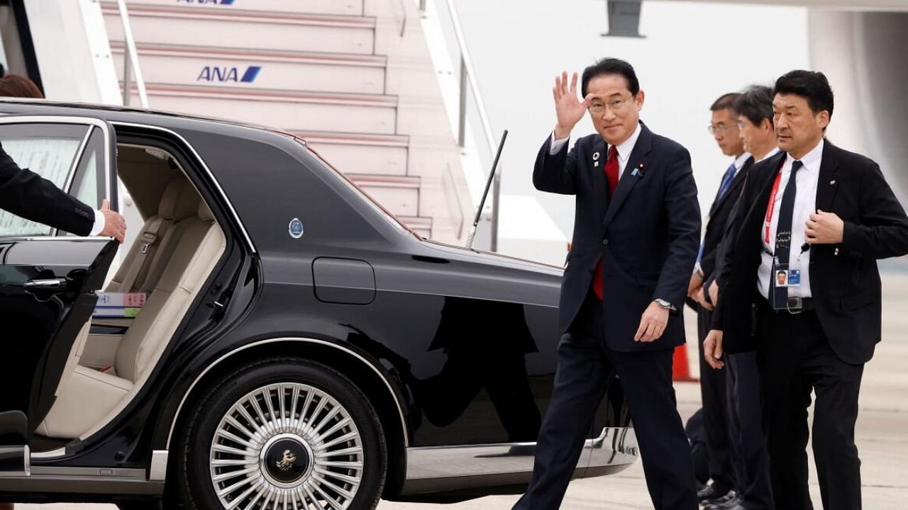 Japanese PM Fumio Kishida arrives at Hiroshima airport to attend the G7 leaders' summit in Mihara, Hiroshima. Credit: Reuters Photo