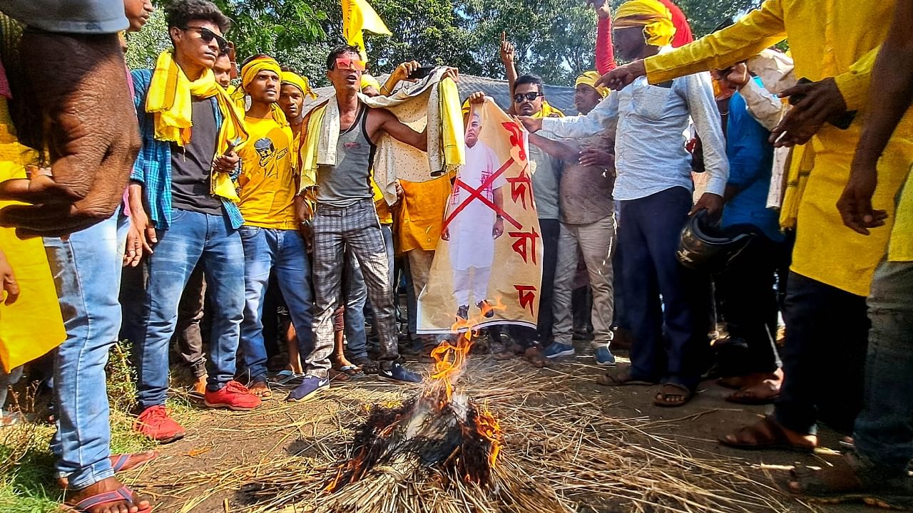 Members of the Kurmi community stage a protest over BJP MP Dilip Ghosh's alleged comments regarding the community, in Paschim Medinipur district, Wednesday, May 17, 2023. Credit: PTI Photo
