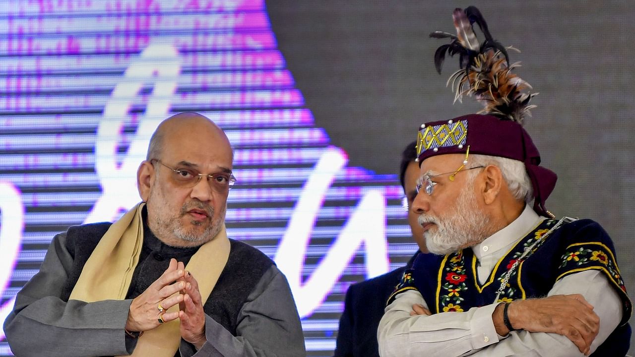 Prime Minister Narendra Modi with Union Home Minister Amit Shah. Credit: PTI Photo