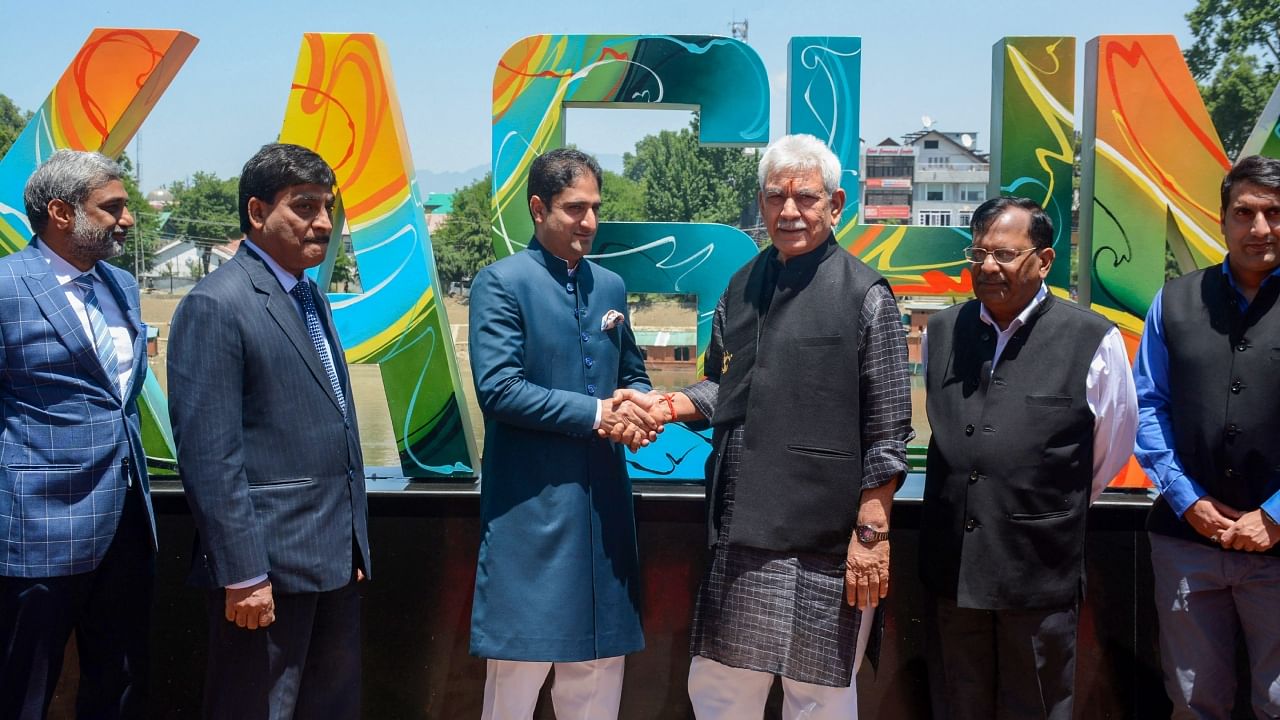 Jammu and Kashmir Lieutenant Governor Manoj Sinha along with senior administrative officials, during the inauguration of the Jhelum Rajbagh Riverfront ahead of G20 tourism working group meeting, in Srinagar, Saturday, May 20, 2023. Credit: PTI Photo