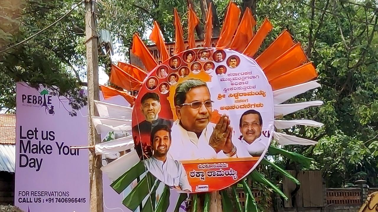Bengaluru streets plastered with eye-catching posters of CM Siddaramaiah. Credit: PTI Photo