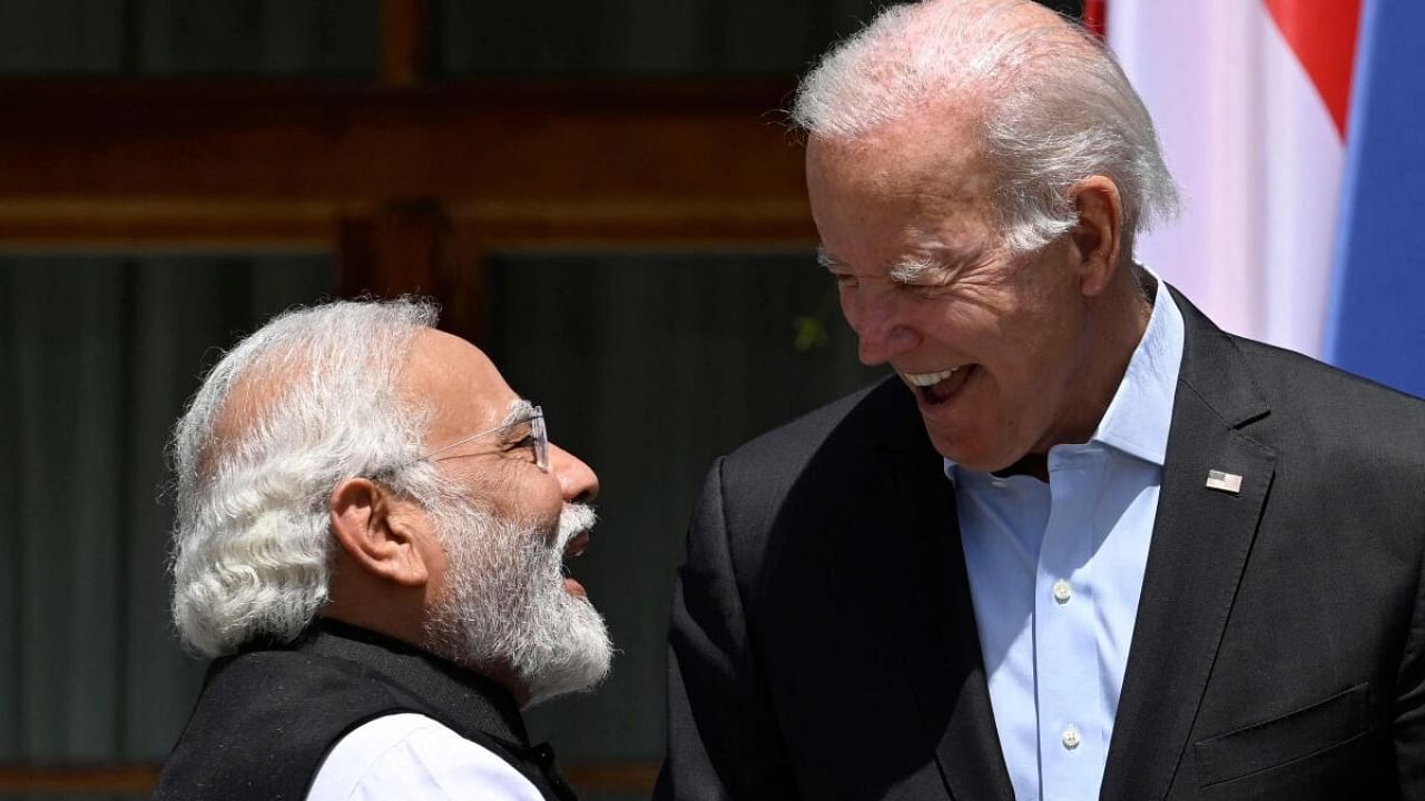 US President Joe Biden (R) and India's Prime Minister Narendra Modi. Credit: AFP Photo