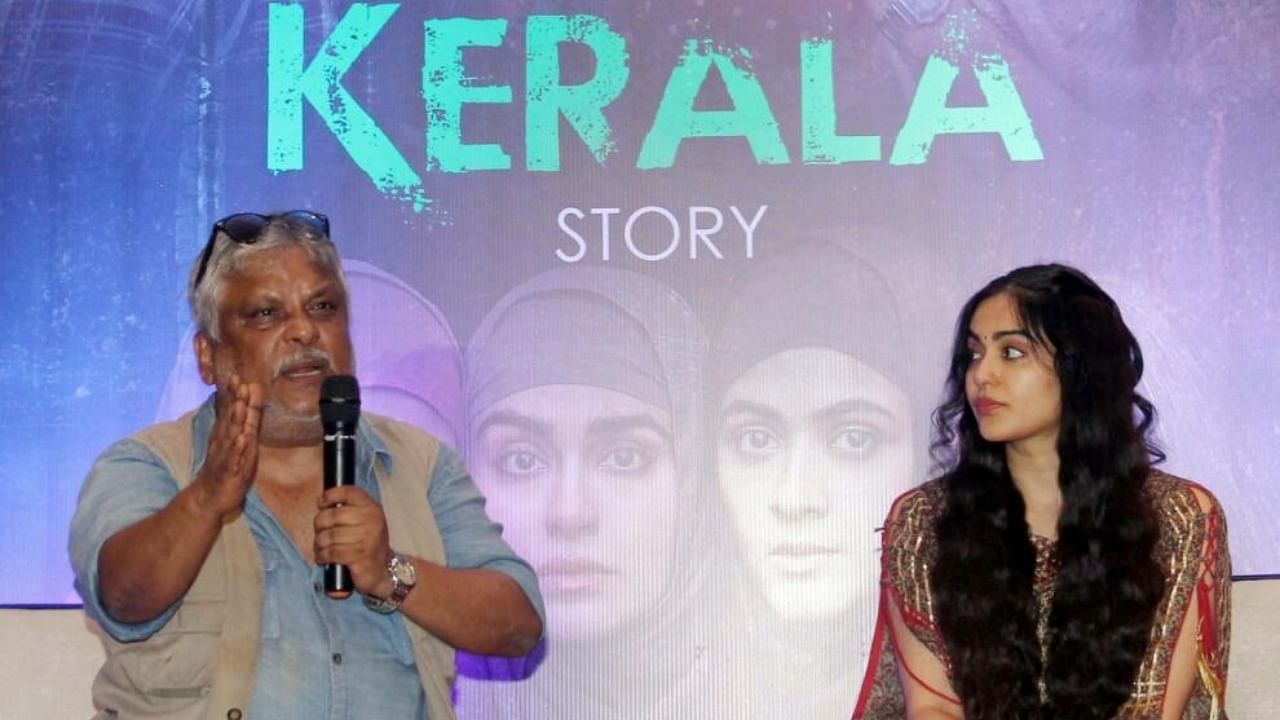  Director Sudipto Sen and Bollywood actress Adah Sharma during a promotional event for 'The Kerala Story' in Kolkata. Credit: IANS Photo