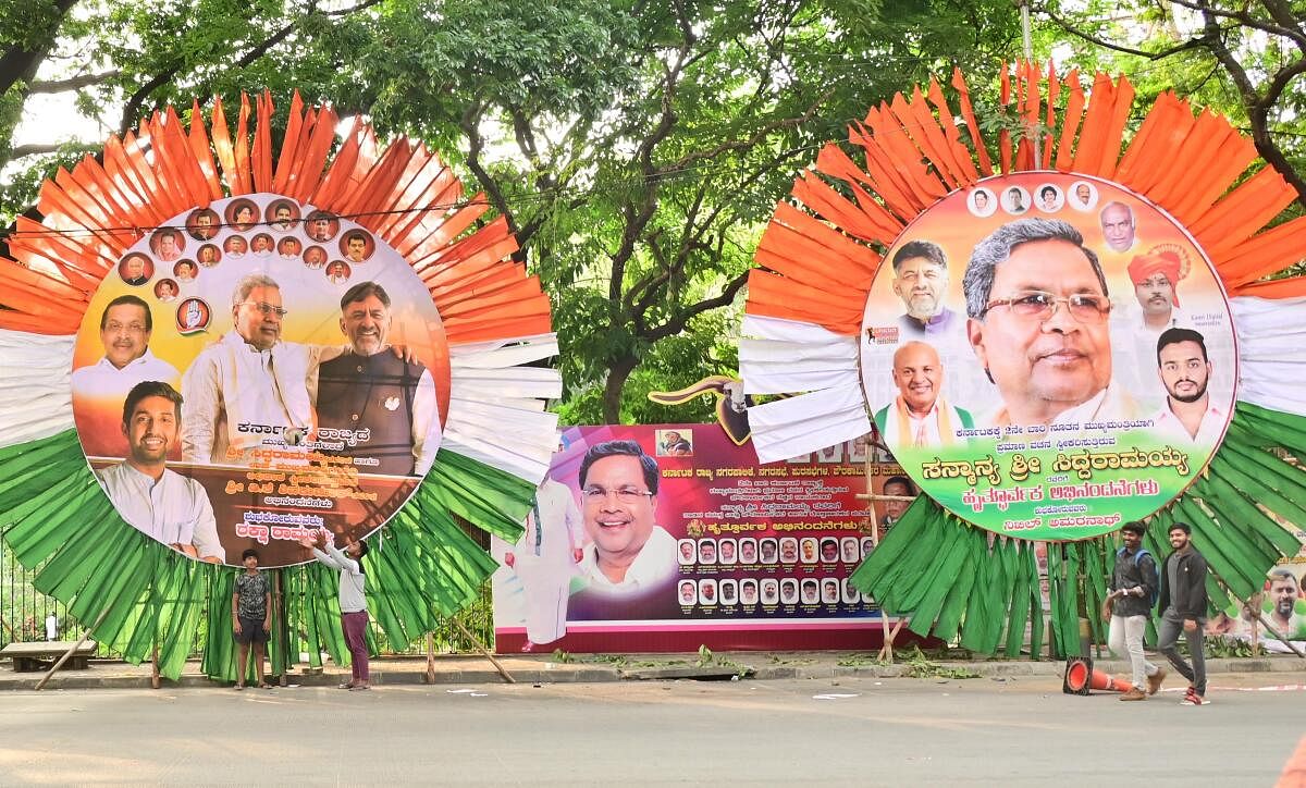 Huge cutouts of political leaders erected around Kanteerava Stadium in Bengaluru. DH Photo/Kishor Kumar Bolar