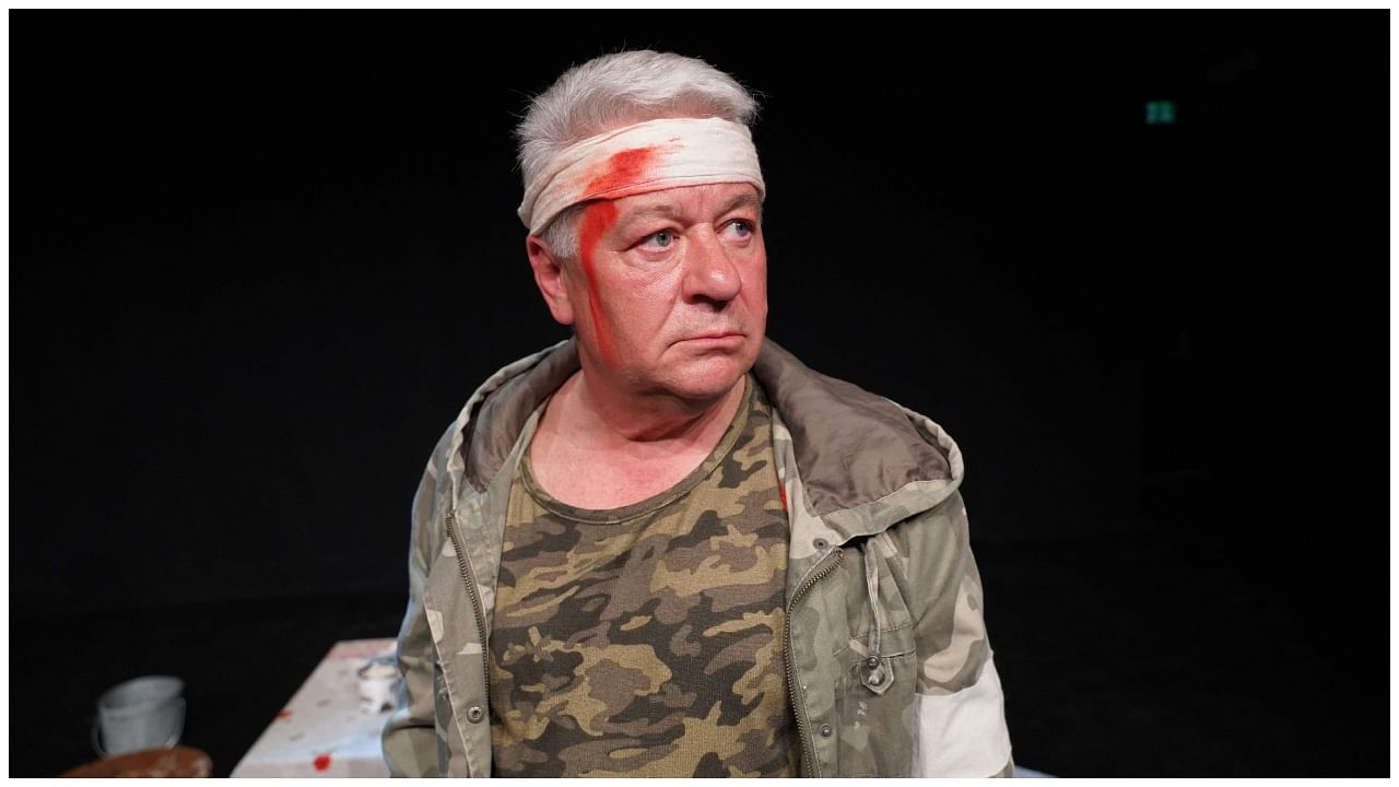 Ukrainian Actor and playwright Anatoli Zinovenko poses during a rehearsal of his play ’Special Operation’ at Katapult Theatre in Aarhus, Denmark on May 20, 2023. Credit: AFP Photo