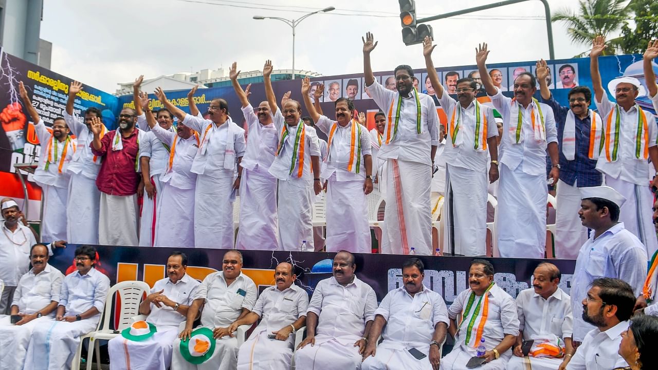 United Democratic Front (UDF) leaders wave at the supporters durnig their protest against the Kerala government, in Thiruvananthapuram, Saturday, May 20, 2023. Credit: PTI Photo