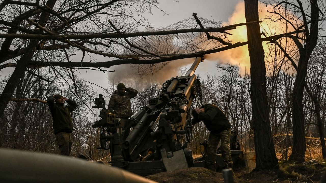 Ukrainian servicemen fire a M777 howitzer at Russian positions near Bakhmut, eastern Ukraine, on March 17, 2023, amid the Russian invasion of Ukraine. Russia's private army Wagner claimed on May 20, 2023, the total control of the east Ukrainian city of Bakhmut, the epicentre of fighting, as Kyiv said the battle was continuing but admitted the situation was 'critical'. Credit: AFP Photo