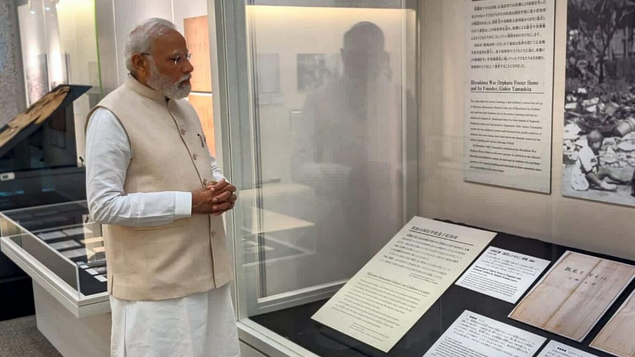 Prime Minister Narendra Modi visits the Hiroshima Peace Memorial Museum, in Hiroshima, Japan. Credit: PTI Photo