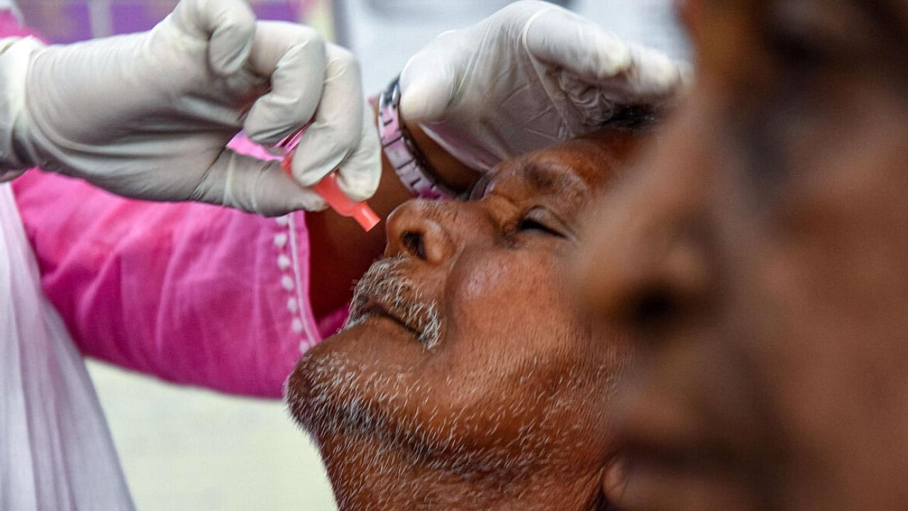 A health worker administers a dose of COVID-19 vaccine to a senior citizen at a vaccination centre in Mumbai. Credit: PTI Photo