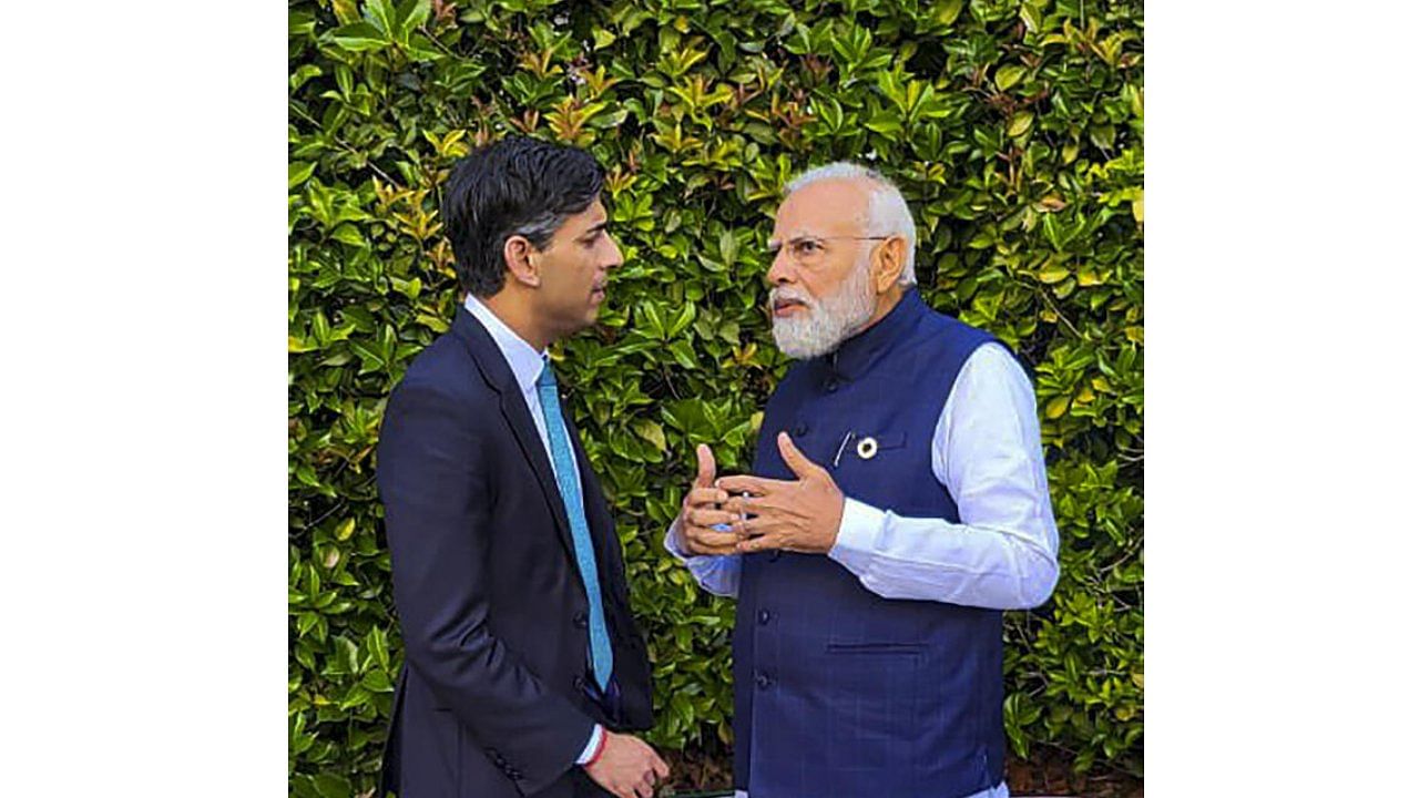 Prime Minister Narendra Modi with UK Prime Minister Rishi Sunak during a meeting on the sidelines of the G-7 Summit. Credit: PTI Photo