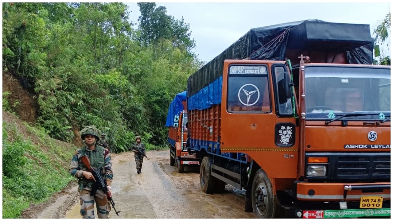 Army personnel providing security to a truck on NH-37 in Manipur, recently. Credit: Indian Army