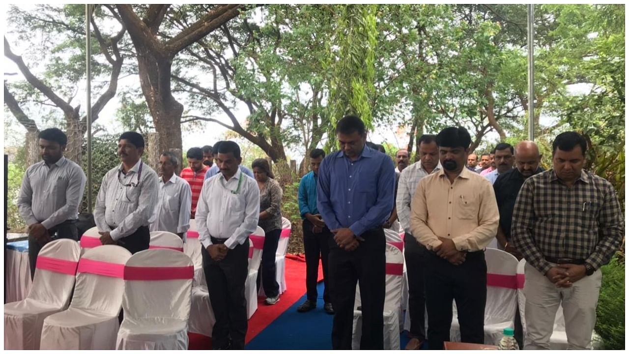 Deputy Commissioner Ravi Kumar M R, MCC Commissioner Channabasappa K and others pay homage at the memorial site of those who died in the Air India Express crash on May 22, 2010, in Kuloor on Monday. Credit: Special arrangement 