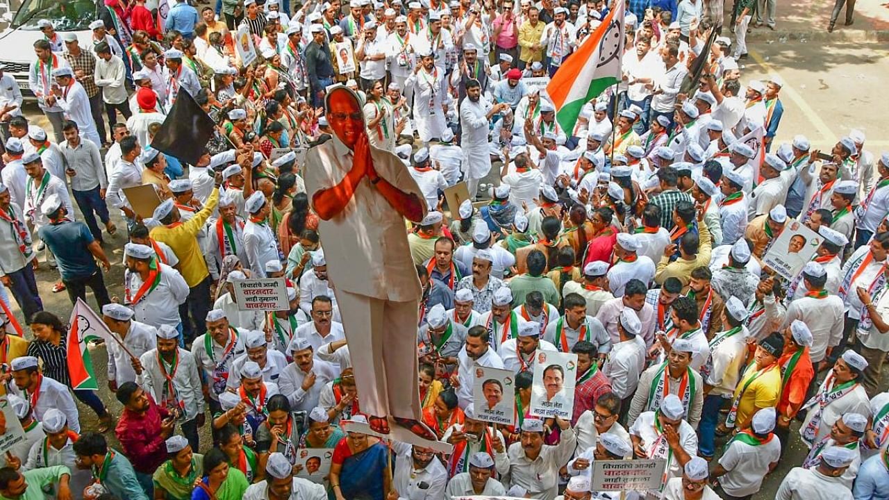 NCP supporters protest ED summons to Jayant Patil. Credit: PTI Photo