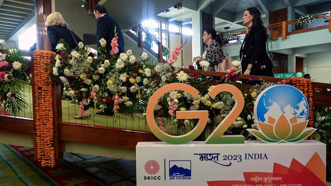 Foreign delegates arrive to attend a G20 tourism meeting at the SKICC convention centre in Srinagar. Credit: AFP Photo