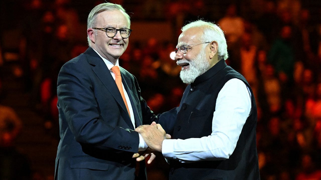 Prime Minister Narendra Modi and Australia's Prime Minister Anthony Albanese embrace following a community event at Qudos Bank Arena in Sydney. Credit: Reuters Photo