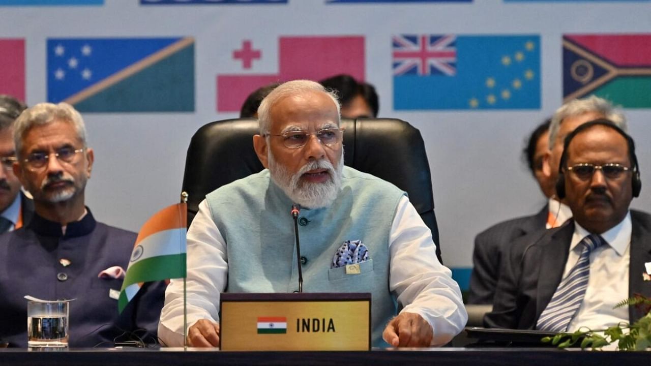 Prime Minister Narendra Modi delivers his opening remarks during Forum for India–Pacific Islands Cooperation at APEC Haus in Port Moresby. Credit: AFP Photo