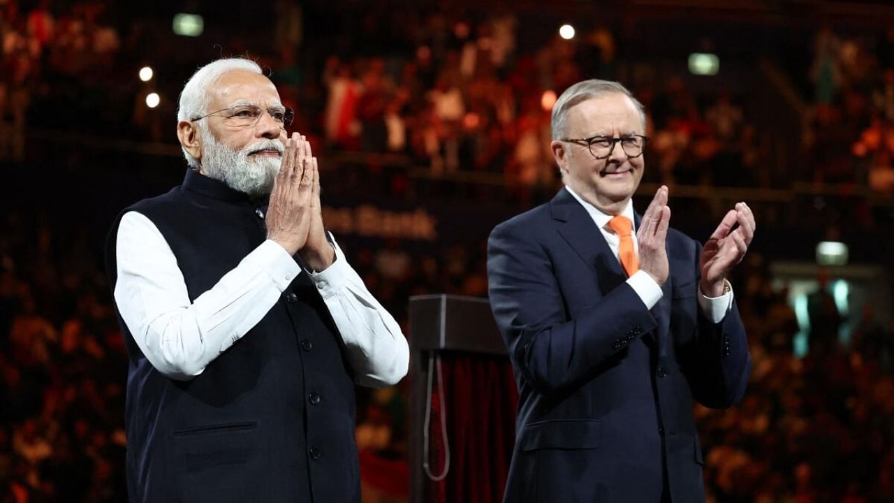 PM Modi and his Australian counterpart Anthony Albanese at the Qudos Arena in Sydney. Credit: AFP Photo