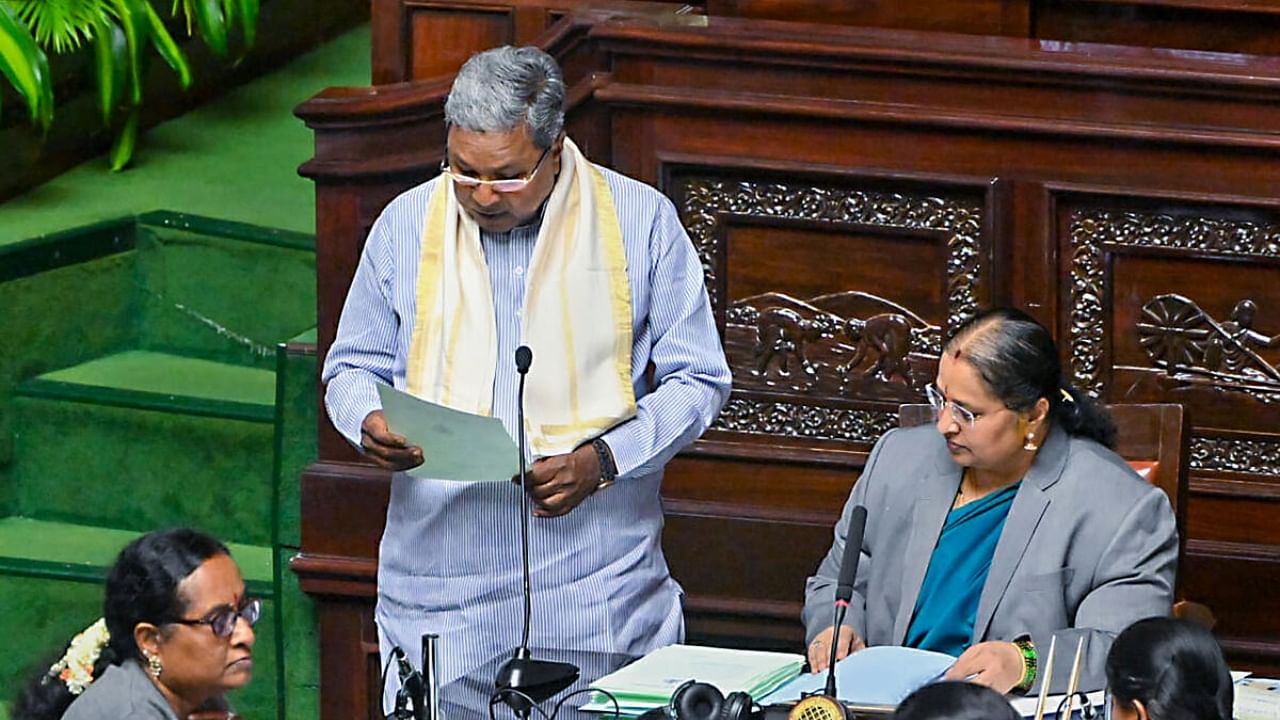 Karnataka Chief Minister Siddaramaiah takes oath as MLA during the first day of Karnataka Assembly session. Credit: PTI Photo