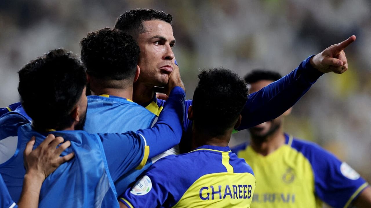 Al Nassr's Cristiano Ronaldo celebrates scoring their third goal. Credit: Reuters Photo
