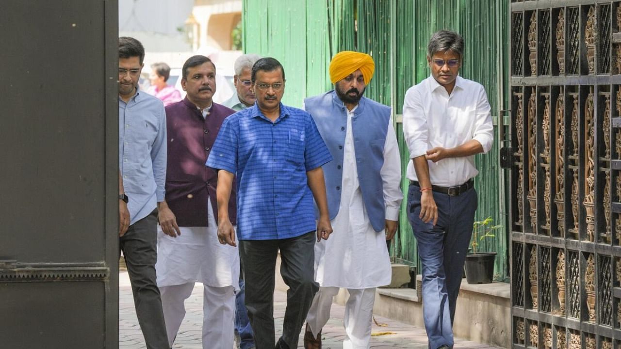 Delhi Chief Minister Arvind Kejriwal along with Punjab CM Bhagwant Mann, party's Rajya Sabha MPs Sanjay Singh and Raghav Chadha. Credit: PTI Photo