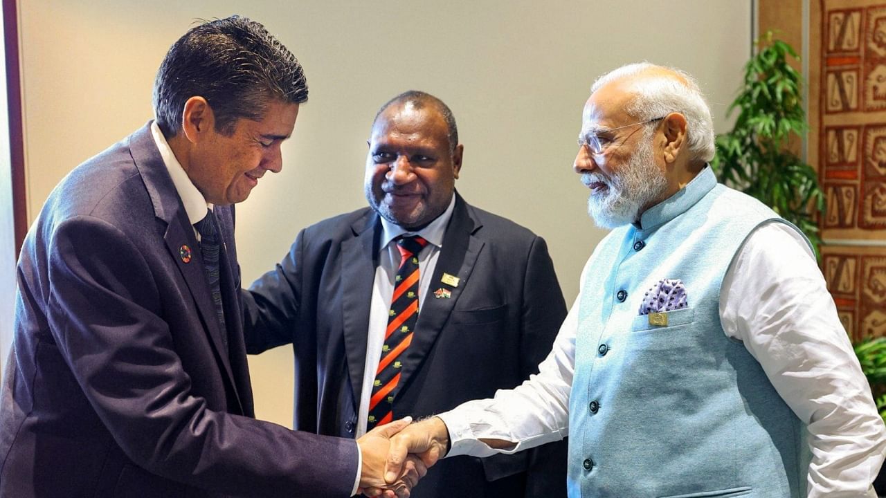Prime Minister Narendra Modi meets President Surangel S Whipps, Jr of the Republic of Palau on the sidelines of FIPIC Summit in Papua New Guinea. Credit: PTI Photo