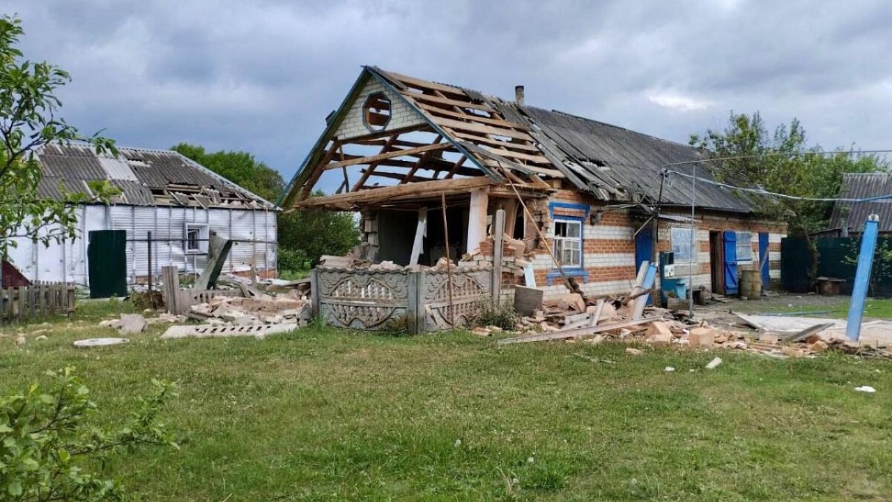 This handout picture posted on May 23, 2023 on the official Telegram account of Vyacheslav Gladkov, governor of the Belgorod region, shows a damaged house in the Belgorod region. Credit: AFP Photo / Telegram / @VVGLADKOV / handout