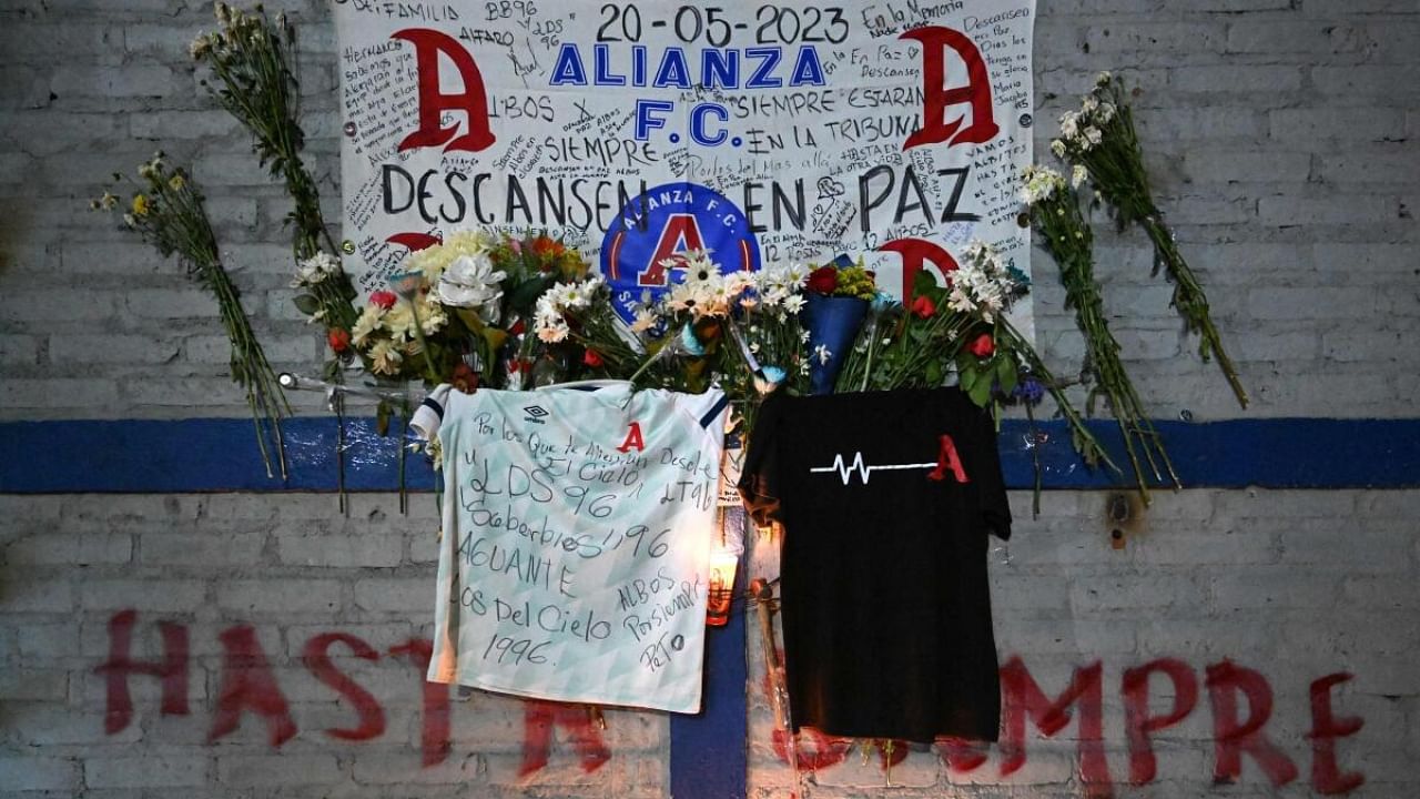 A makeshift memorial for victims of a stampede is pictured outside Cuscatlan stadium in San Salvador. Credit: AFP Photo